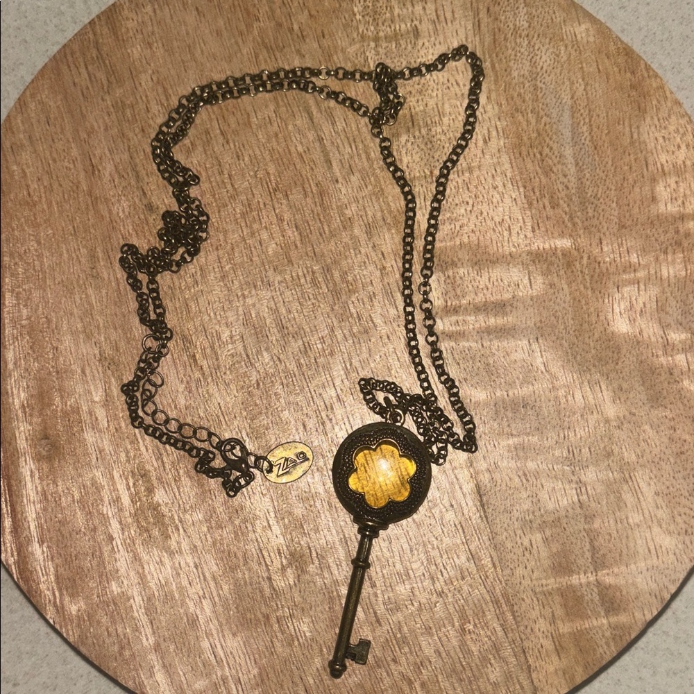 Key Pendant Necklace with Gold Accent